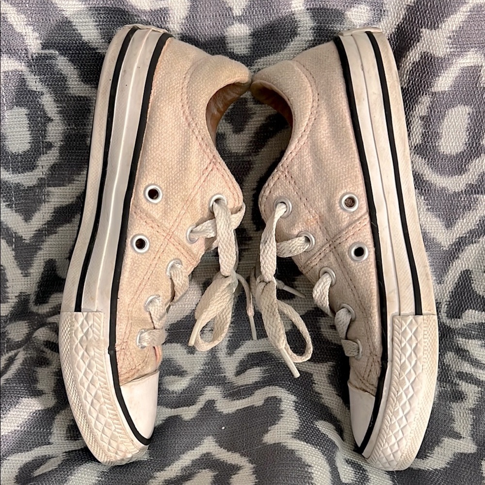 Girls Converse' pale pink sneakers